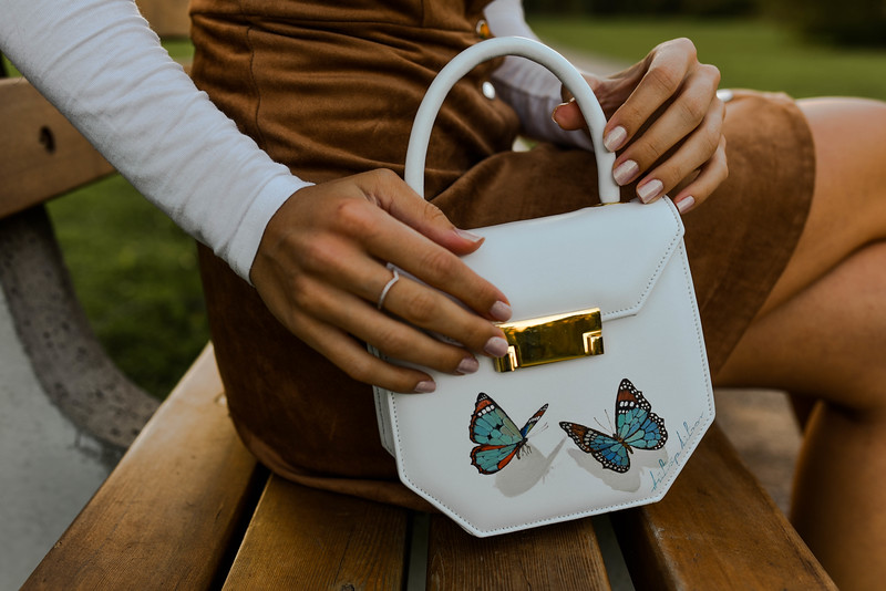 Mini Edgy handbag in white leather with blue butterflies