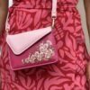 Hot-Pink-Corner-Clutch-Pink-Flap-Tassel-with-Pink-Daisies-close-up