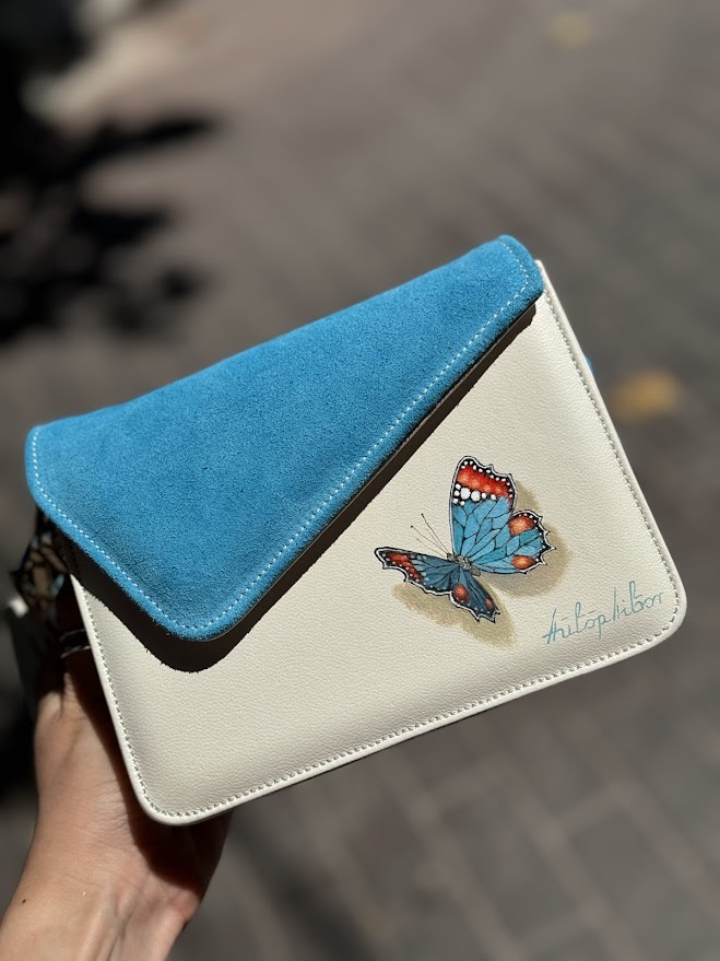 White-Blue-Corner-Clutch-Flap-Tassel-with-Blue-Butterfly-front